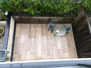 Backyard Deck Finished In Porcelain Paver Planks